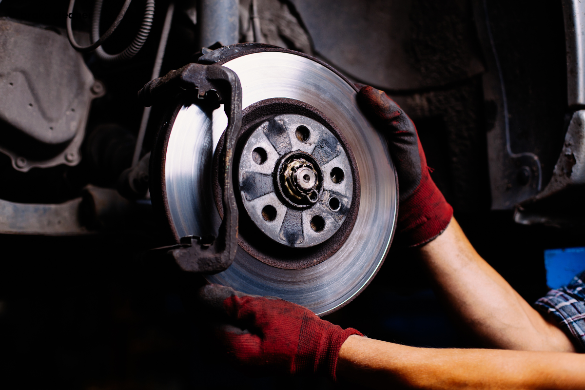 Why do technicians use brake cleaner before inspections?